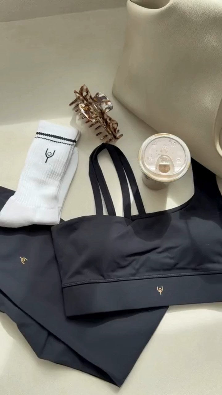 Barley zip-through sweatshirt and joggers worn open over a sports bra, then zipped up
